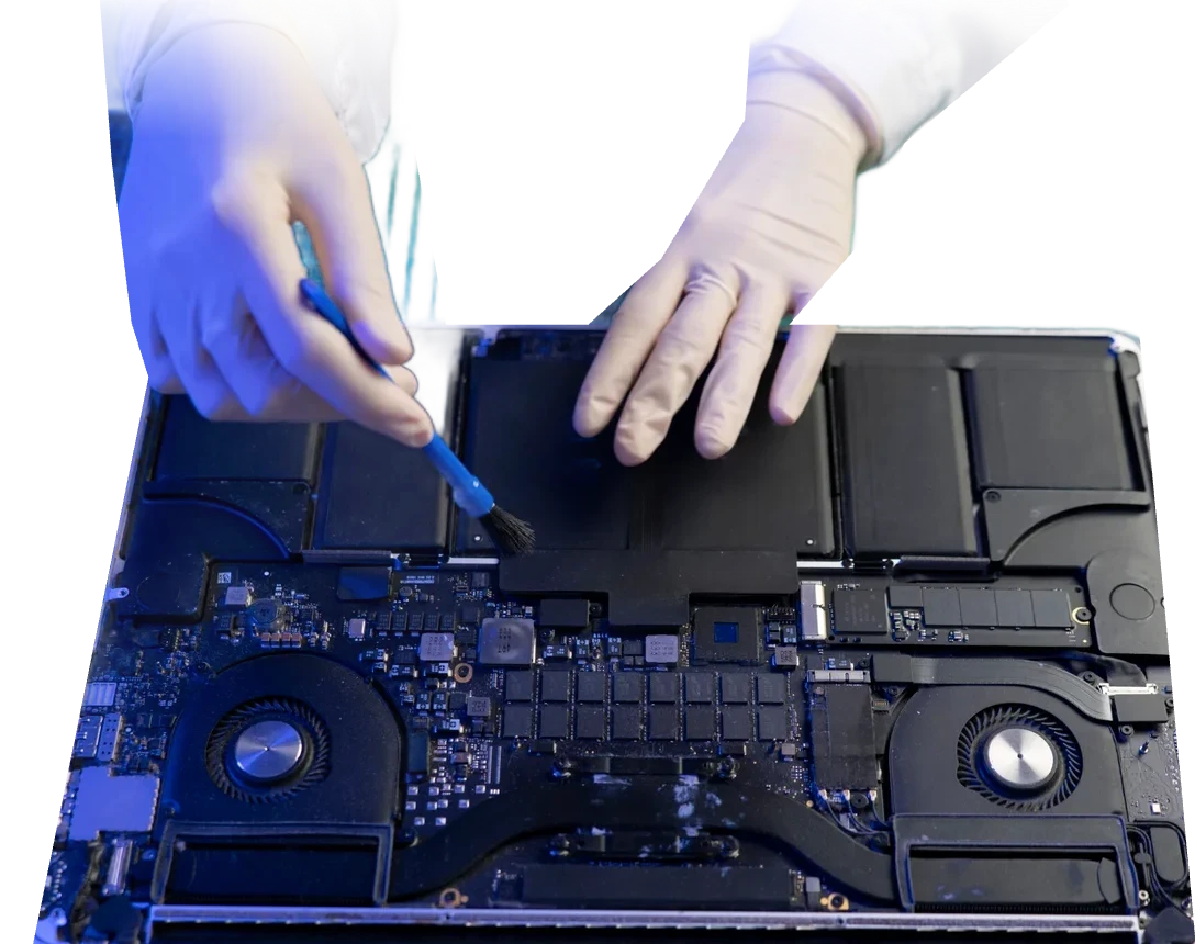 Home 13 Technician repairing an Apple MacBook in Harwich